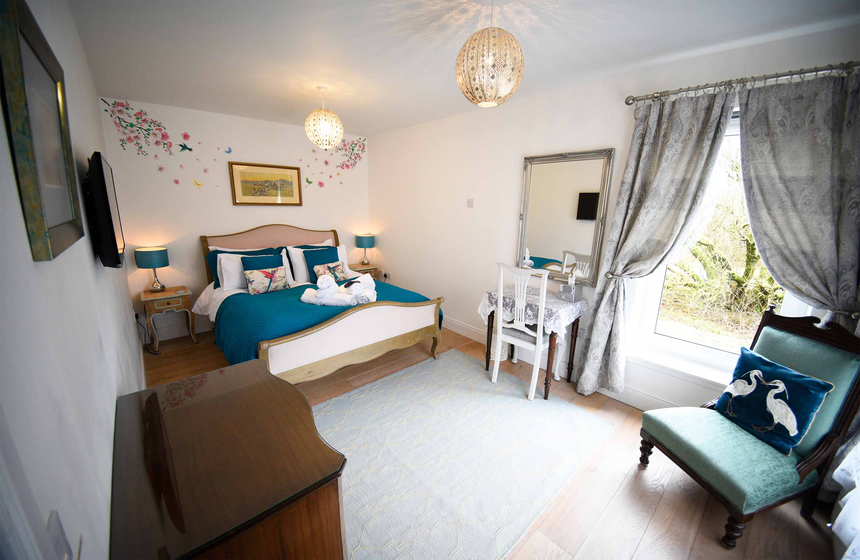 Blossom Folly is a self catering accommodation with comfortable double bed at Araucaria Croft Skye in Dunvegan