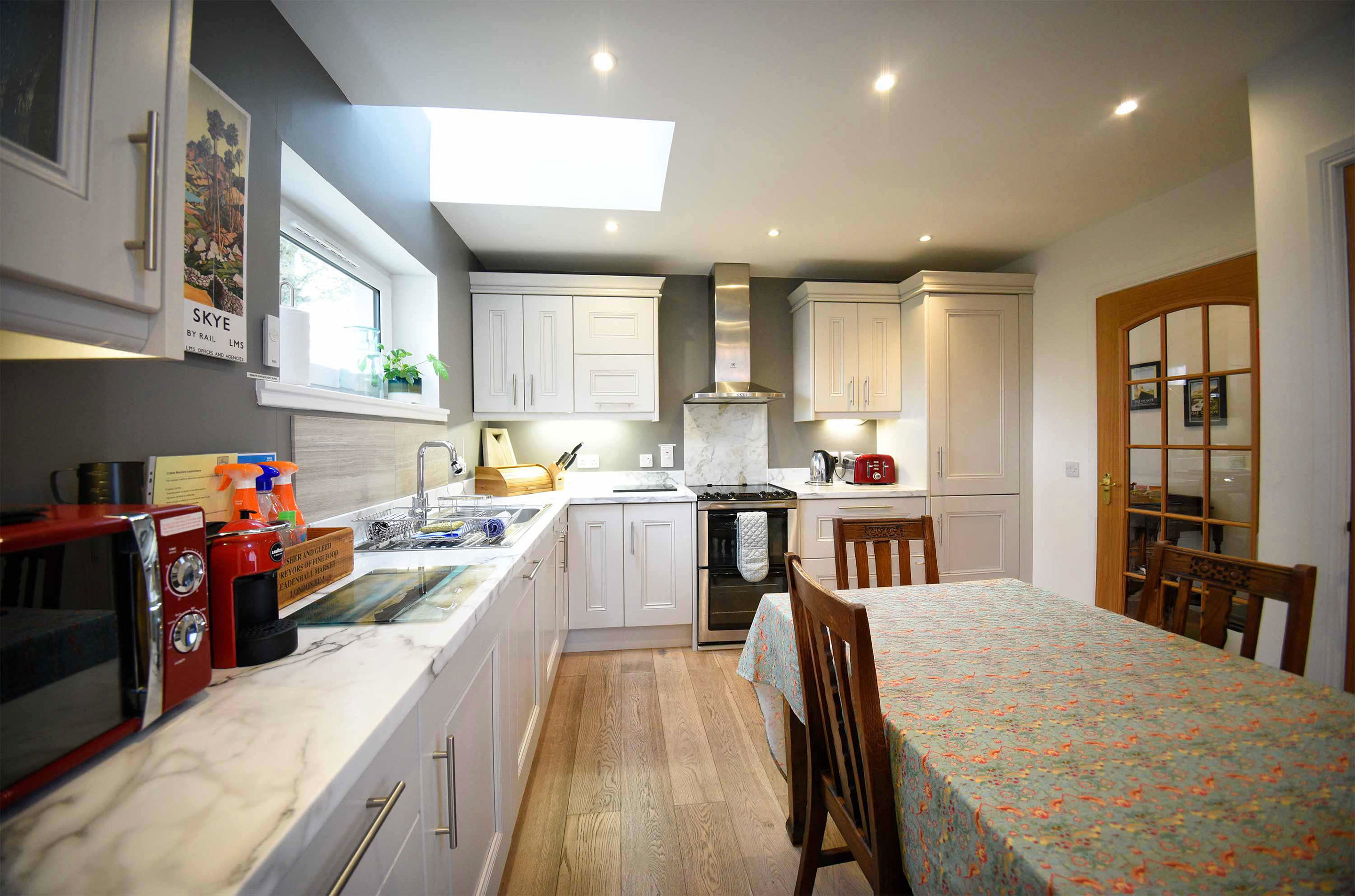 Blossom Folly self catering accommodation contains a modern kitchen at Araucaria Croft Skye in Dunvegan